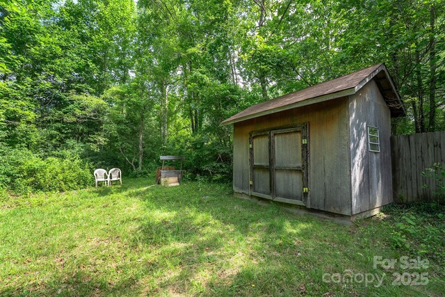 38 Hidden Forest Dr, Hendersonville, NC 28792 - view of shed featuring a wooded view