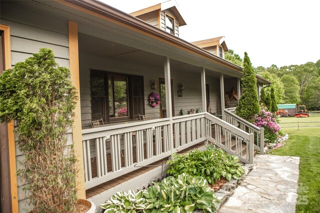 171 Shores Way, Boone, NC 28607 - property entrance featuring covered porch and a yard
