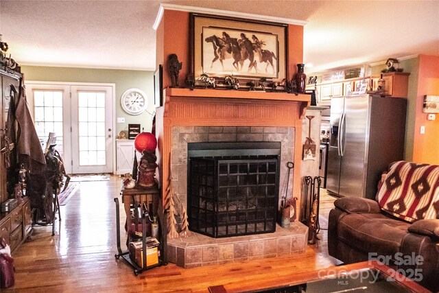171 Shores Way, Boone, NC 28607 - living area with a tiled fireplace and wood finished floors