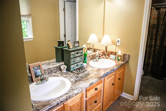 171 Shores Way, Boone, NC 28607 - full bath featuring double vanity, tile patterned flooring, toilet, and baseboards
