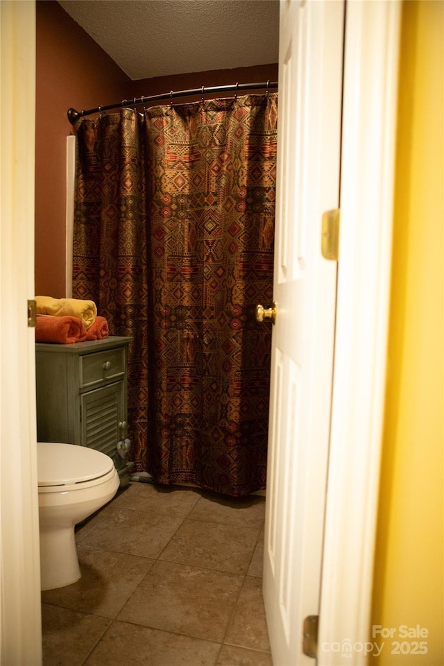 171 Shores Way, Boone, NC 28607 - bathroom with toilet, tile patterned flooring, a textured ceiling, and vanity