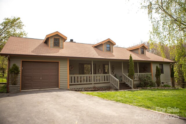 171 Shores Way, Boone, NC 28607 - view of front of house with a porch, a garage, a front lawn, and driveway
