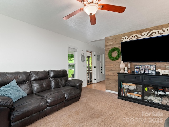 540 Windswept Ridge Rd, Canton, NC 28716 - living area with wooden walls, carpet flooring, and ceiling fan