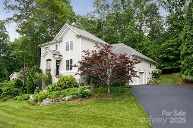 7 White Palmer Ct, Biltmore Lake, NC 28715 - view of front of property with stucco siding and a front lawn