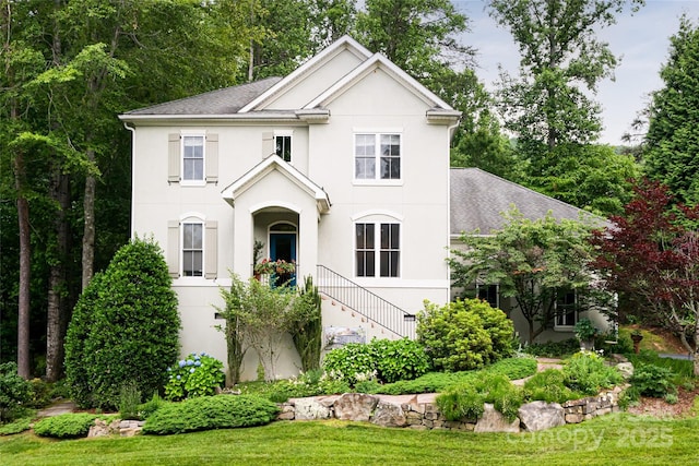 7 White Palmer Ct, Biltmore Lake, NC 28715 - view of front facade with stucco siding, roof with shingles, and stairway