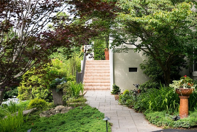 7 White Palmer Ct, Biltmore Lake, NC 28715 - view of side of home featuring stairway and stucco siding