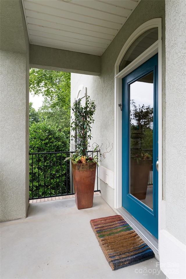 7 White Palmer Ct, Biltmore Lake, NC 28715 - property entrance with stucco siding