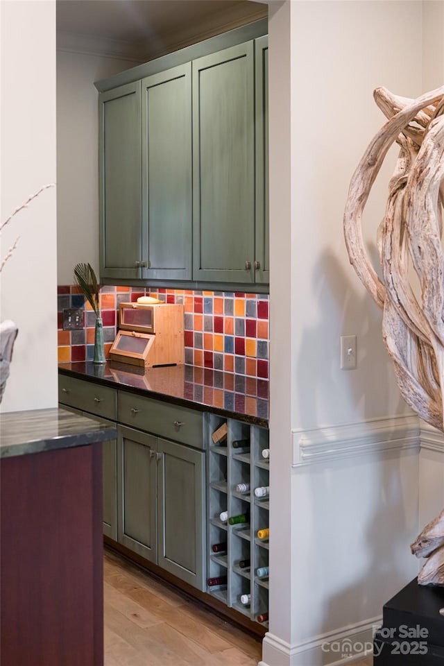 7 White Palmer Ct, Biltmore Lake, NC 28715 - bar with decorative backsplash, crown molding, and light wood-type flooring