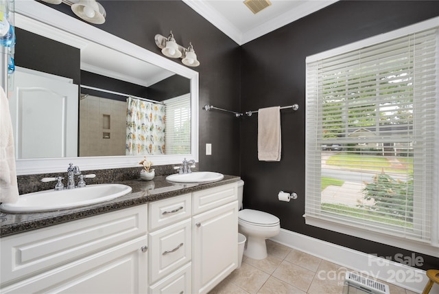 1701 Truman Rd, Charlotte, NC 28205 - full bathroom featuring crown molding, tile patterned flooring, double vanity, curtained shower, and plenty of natural light