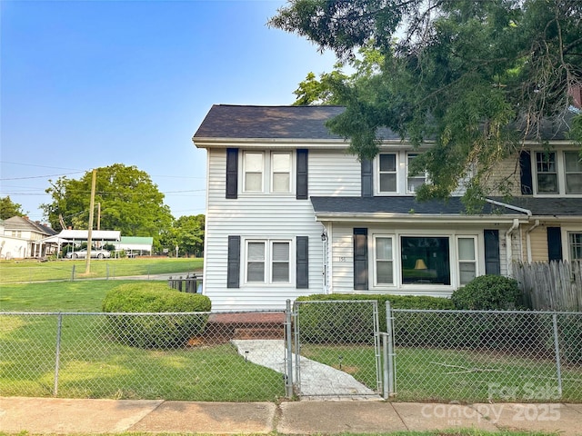 156 Spruce St, Badin, NC 28009 - view of front of house featuring a gate and roof with shingles