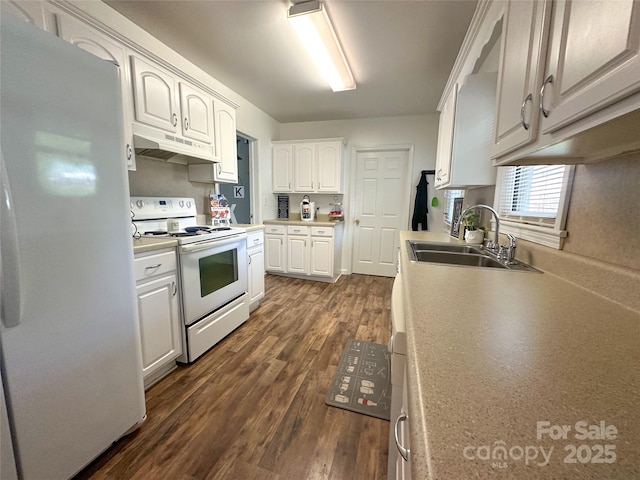 156 Spruce St, Badin, NC 28009 - kitchen with white appliances, under cabinet range hood, a sink, white cabinetry, and dark wood-type flooring