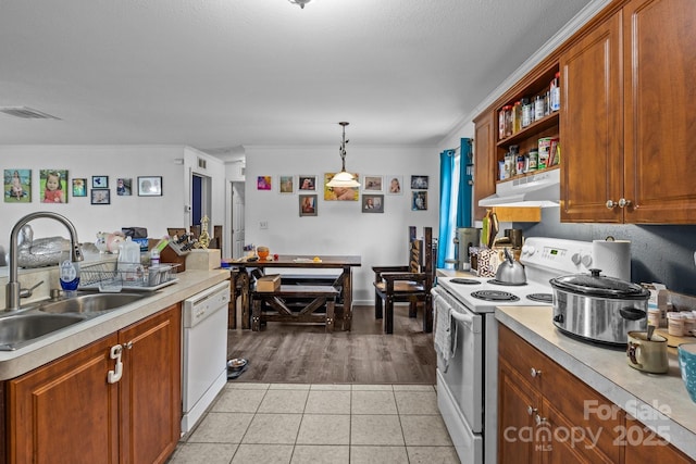 8650 Lambs Way, Connelly Springs, NC 28612 - kitchen with white appliances, under cabinet range hood, a sink, light countertops, and open shelves