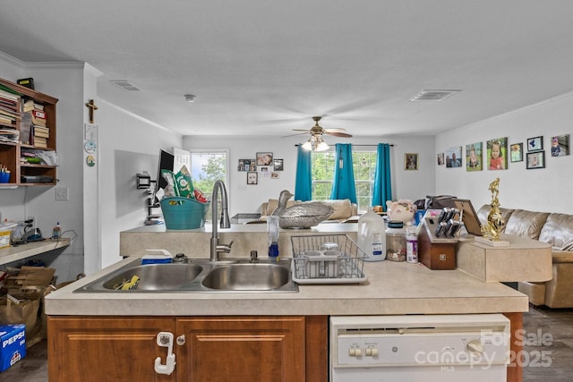 8650 Lambs Way, Connelly Springs, NC 28612 - kitchen featuring open floor plan, white dishwasher, a sink, brown cabinetry, and plenty of natural light