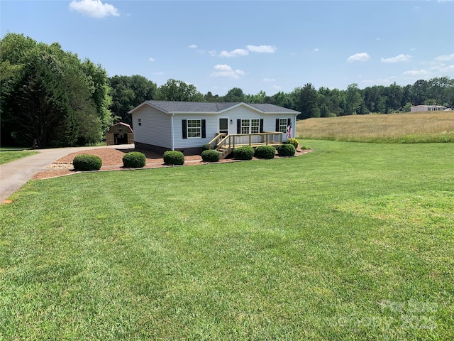 6219 Heavner Rd, Vale, NC 28168 - view of front facade featuring a front yard