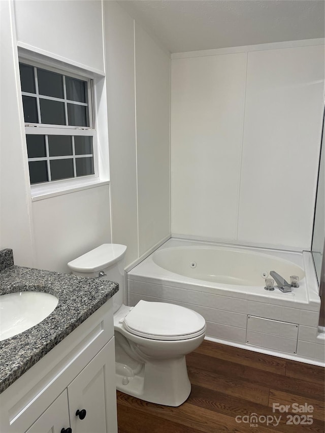 6219 Heavner Rd, Vale, NC 28168 - bathroom featuring wood finished floors, toilet, vanity, and  shower combination