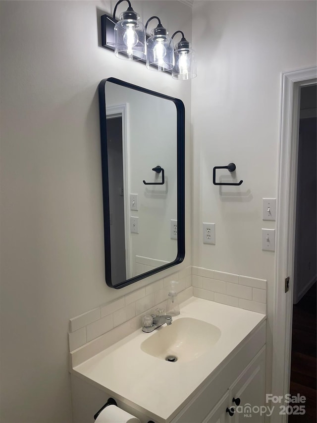 6219 Heavner Rd, Vale, NC 28168 - bathroom featuring vanity and tasteful backsplash