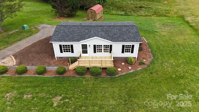 6219 Heavner Rd, Vale, NC 28168 - rear view of property with a yard, roof with shingles, and a wooden deck