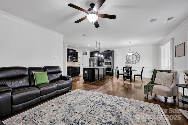 246 Bushney Loop, Mooresville, NC 28115 - living room featuring a ceiling fan, crown molding, dark wood-style floors, and recessed lighting