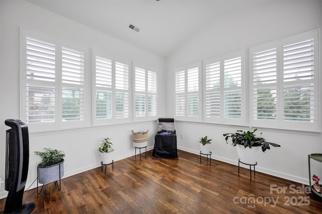 246 Bushney Loop, Mooresville, NC 28115 - sitting room with plenty of natural light, vaulted ceiling, wood finished floors, and baseboards