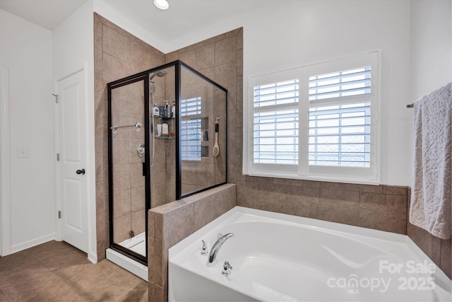 246 Bushney Loop, Mooresville, NC 28115 - bathroom featuring a bath and a stall shower