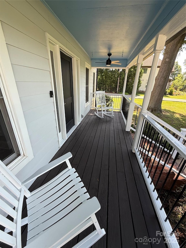 18733 Bluff Point Rd, Cornelius, NC 28031 - wooden porch featuring a ceiling fan