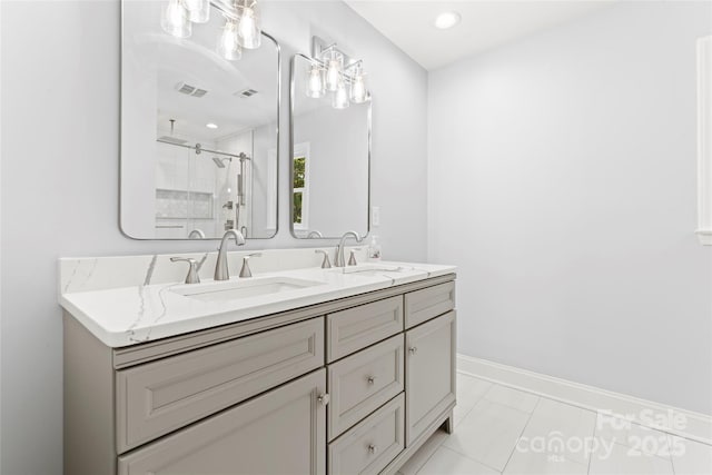 18733 Bluff Point Rd, Cornelius, NC 28031 - bathroom featuring double vanity and a stall shower