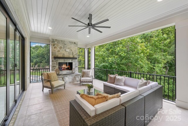 213 Crest Ct, Weddington, NC 28104 - view of patio featuring an outdoor living space with a fireplace and a ceiling fan