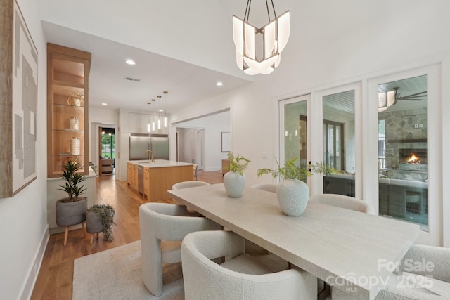 213 Crest Ct, Weddington, NC 28104 - dining area featuring light wood-style floors, recessed lighting, and baseboards