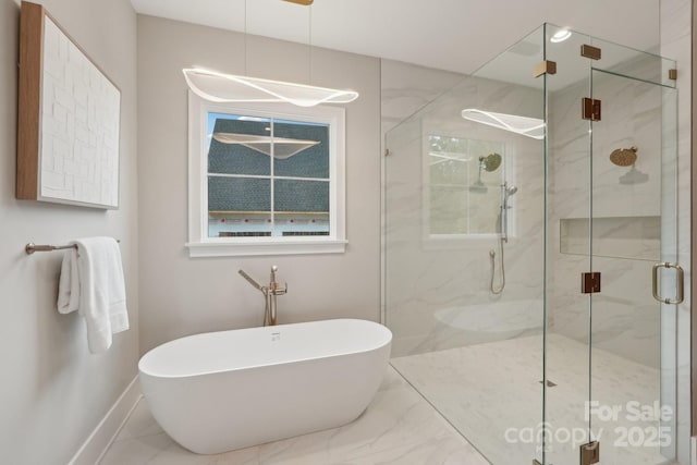 213 Crest Ct, Weddington, NC 28104 - bathroom featuring a freestanding tub, a marble finish shower, marble finish flooring, and baseboards