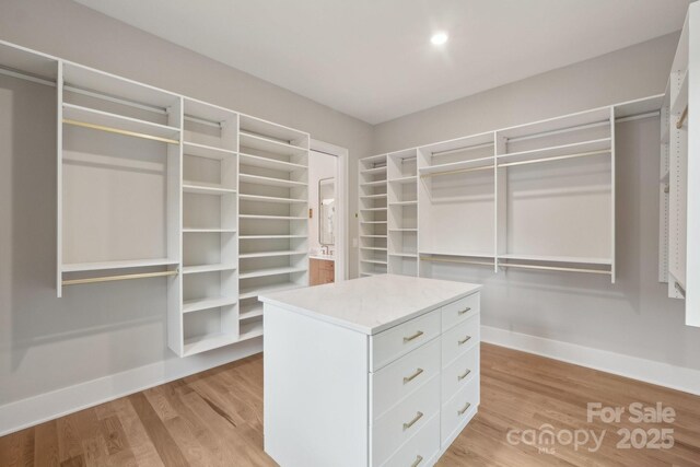 213 Crest Ct, Weddington, NC 28104 - walk in closet featuring light wood finished floors