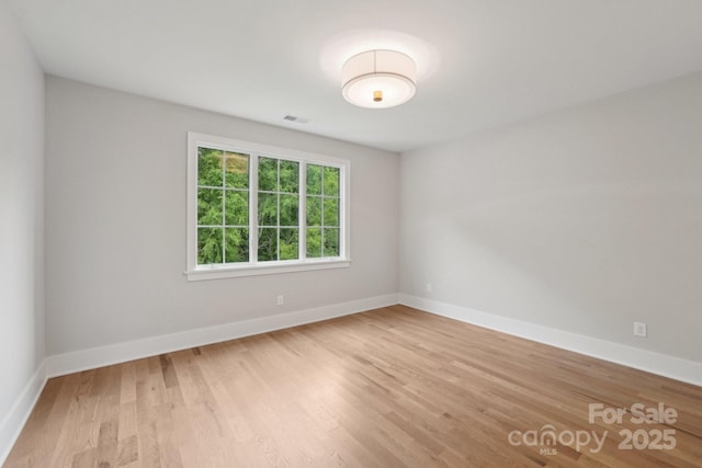 213 Crest Ct, Weddington, NC 28104 - empty room with wood finished floors and baseboards