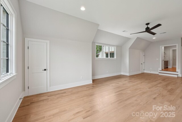 213 Crest Ct, Weddington, NC 28104 - unfurnished living room featuring vaulted ceiling, light wood-style floors, baseboards, recessed lighting, and a ceiling fan