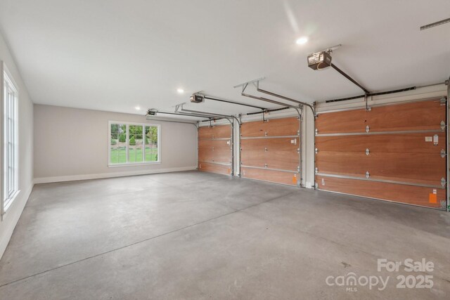 213 Crest Ct, Weddington, NC 28104 - garage with a garage door opener, baseboards, and recessed lighting