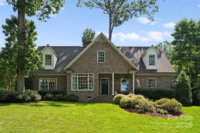 901 Hartford Ave, Charlotte, NC 28209 - view of front of home with brick siding, a front lawn, a shingled roof, and crawl space