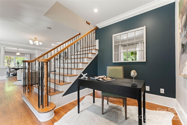 901 Hartford Ave, Charlotte, NC 28209 - stairway with ornamental molding, wood finished floors, baseboards, ornate columns, and recessed lighting