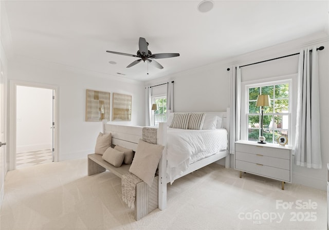 901 Hartford Ave, Charlotte, NC 28209 - bedroom featuring light colored carpet, ornamental molding, and a ceiling fan