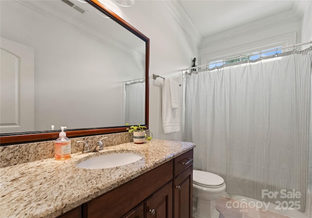 901 Hartford Ave, Charlotte, NC 28209 - full bathroom with crown molding, vanity, toilet, a shower with curtain, and tile patterned flooring