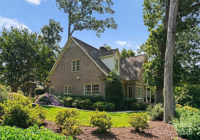 901 Hartford Ave, Charlotte, NC 28209 - view of home's exterior with brick siding and a chimney
