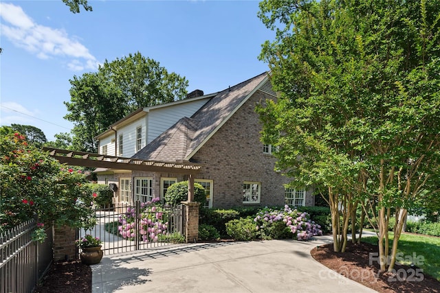 901 Hartford Ave, Charlotte, NC 28209 - view of side of home with brick siding and a gate