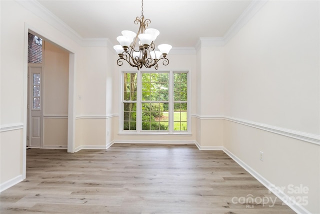 7704 Ninth Fairway Ln, Mint Hill, NC 28227 - unfurnished dining area with a chandelier, wood finished floors, and ornamental molding