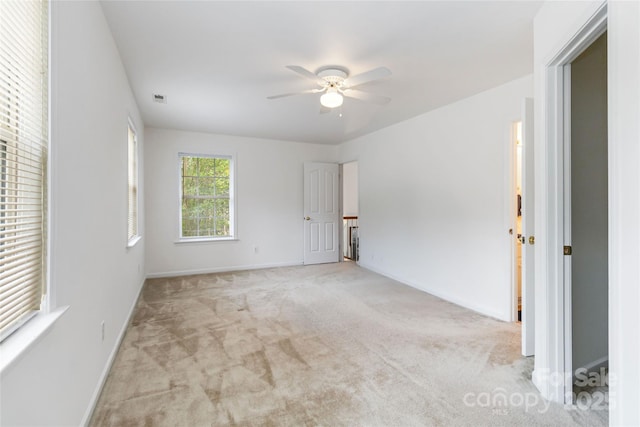 7704 Ninth Fairway Ln, Mint Hill, NC 28227 - empty room featuring a ceiling fan and carpet