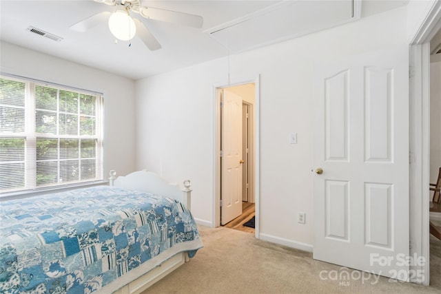 7704 Ninth Fairway Ln, Mint Hill, NC 28227 - bedroom featuring attic access, light carpet, and a ceiling fan