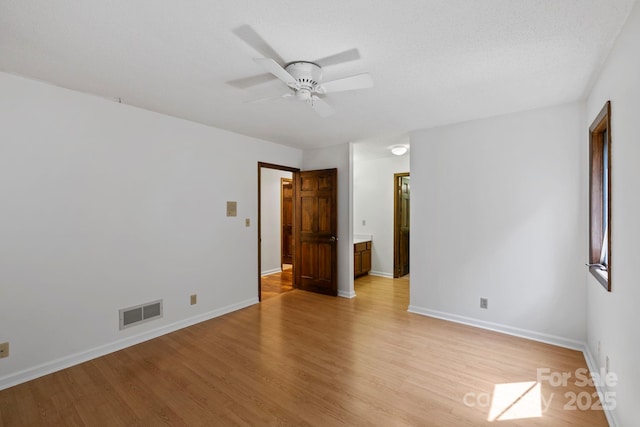 204 Woodfield Dr, Asheville, NC 28803 - unfurnished room with light wood-style floors and a ceiling fan