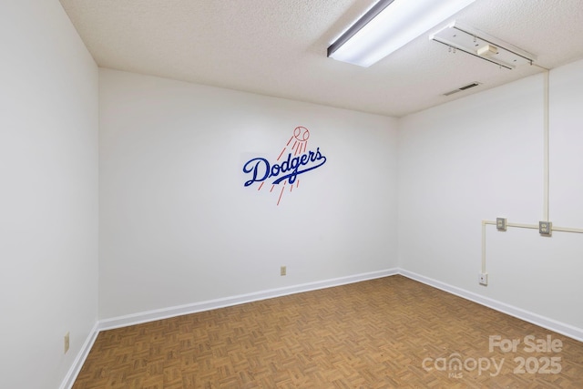 204 Woodfield Dr, Asheville, NC 28803 - unfurnished room with a textured ceiling