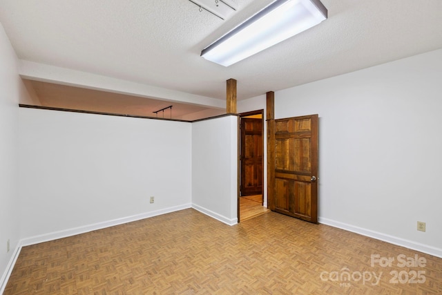 204 Woodfield Dr, Asheville, NC 28803 - finished below grade area featuring baseboards and a textured ceiling