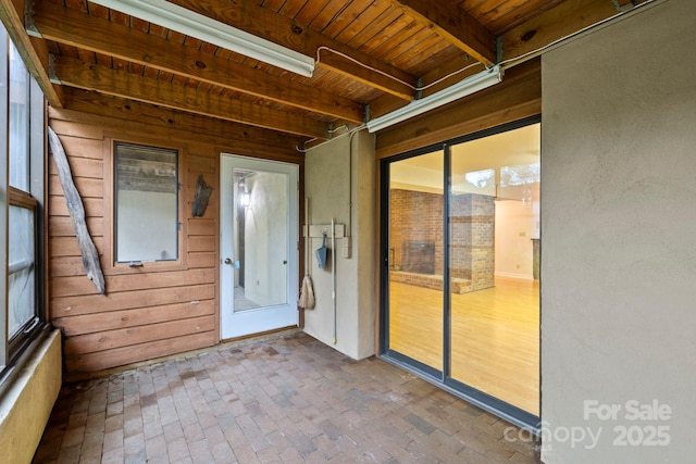 204 Woodfield Dr, Asheville, NC 28803 - unfurnished sunroom with beamed ceiling