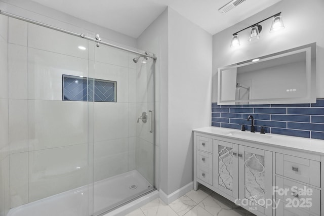 1319 Mt Gallant Rd, Rock Hill, SC 29732 - full bathroom with marble finish flooring, baseboards, a stall shower, vanity, and backsplash
