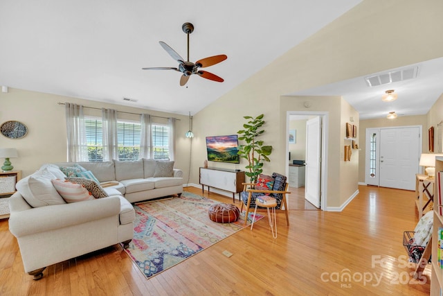 145 Fairway View Dr, Etowah, NC 28729 - living room with light wood-type flooring, ceiling fan, baseboards, and high vaulted ceiling