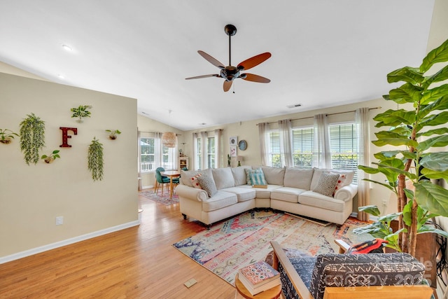 145 Fairway View Dr, Etowah, NC 28729 - living room featuring vaulted ceiling, light wood-style floors, ceiling fan, and baseboards