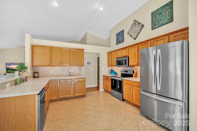 145 Fairway View Dr, Etowah, NC 28729 - kitchen with stainless steel appliances, a sink, tasteful backsplash, light countertops, and light tile patterned floors